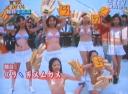click for larger image of scantily clad dancers displaying signs with zhuyin fuhao