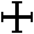 a cross potent, which looks like a plus sign with perpendicular stems on the end of each of the four lines, but not so long as to make a cross in a square; image copied from Wikipedia