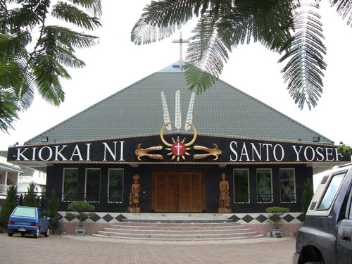 photo of a church, with 'KIOKAI NI' and 'SANTO YOSEF' written on it in large letters